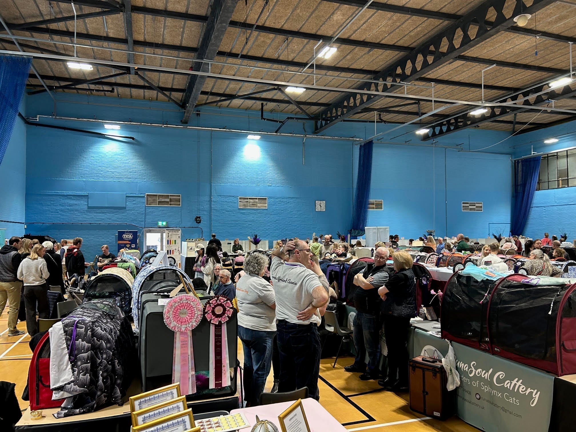 hall full of people gathered to take part in a cat show
