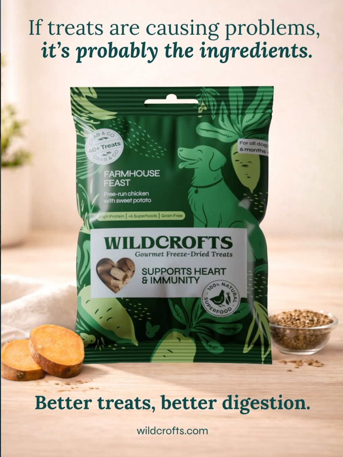 Wildcrofts Farmhouse Feast freeze-dried dog treats pack on a wooden surface, with sweet potato and seeds beside it. Text reads: “If treats are causing problems, it’s probably the ingredients. Better treats, better digestion.”