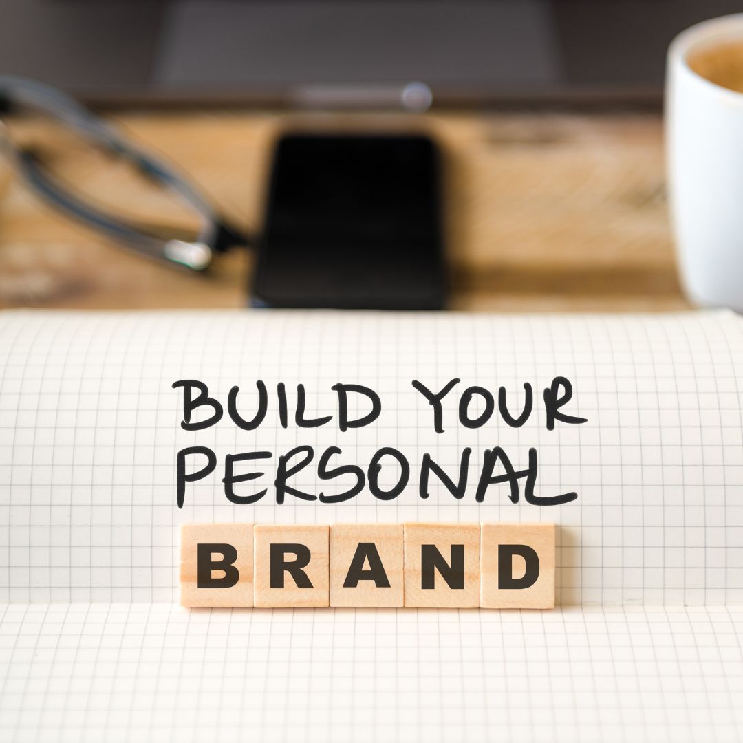 Personal brand sign with wooden tiles on notepad